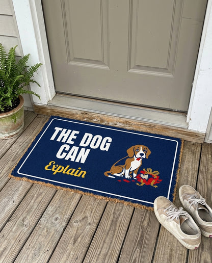 The Dog Can Explain funny dog doormat on a front porch