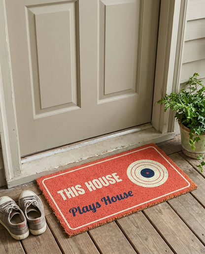 This House Plays House house music doormat on a front porch