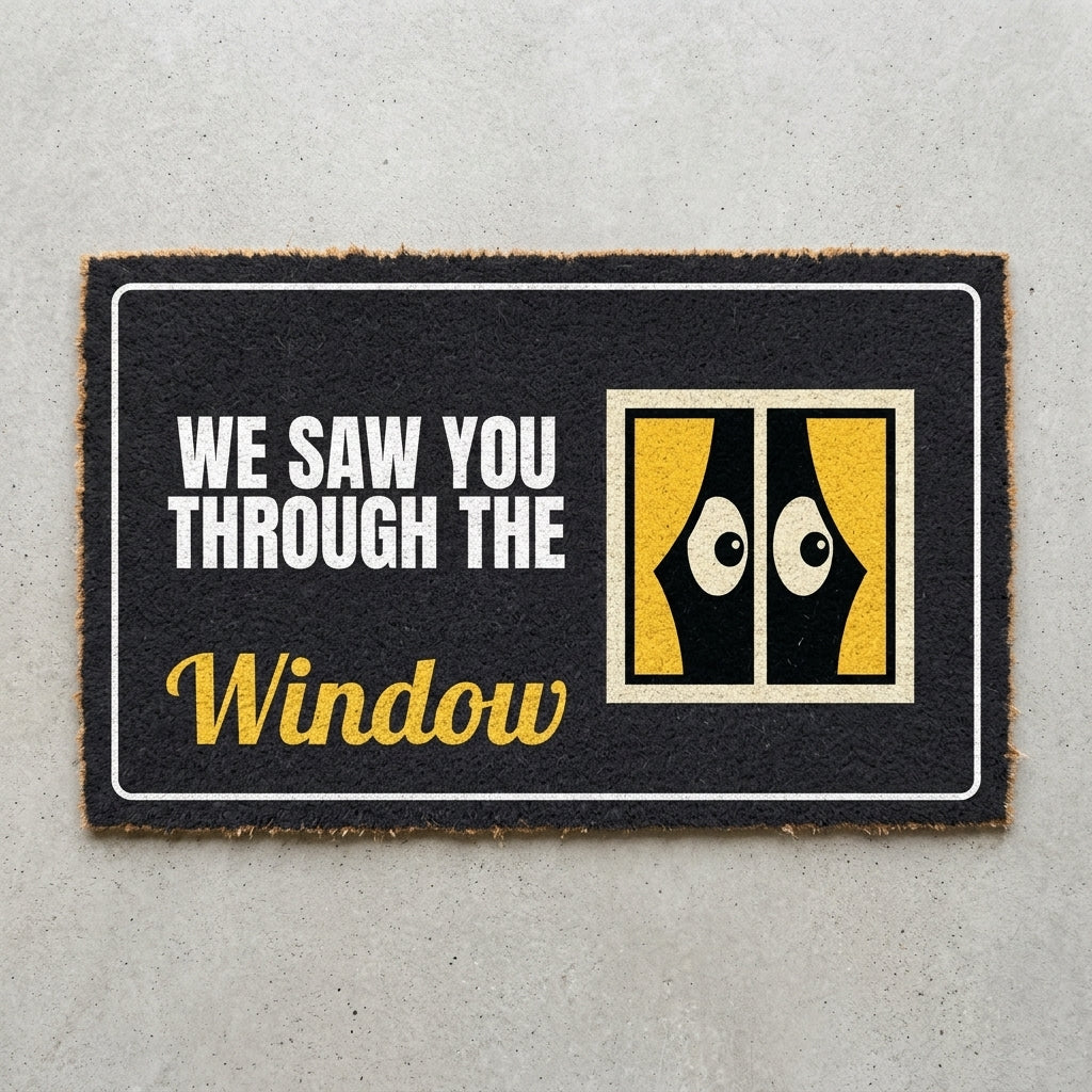 We Saw You Through The Window doormat 30x18 in charcoal with a window and peeking eyes