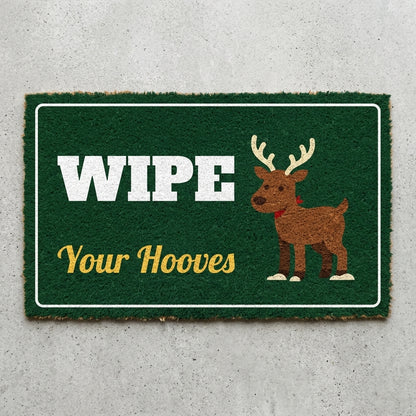Wipe Your Hooves doormat 30x18 in dark green with a cartoon reindeer