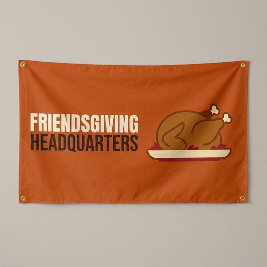 Friendsgiving Headquarters flag 3x5 in burnt orange with a roast turkey on a platter, hung on a wall