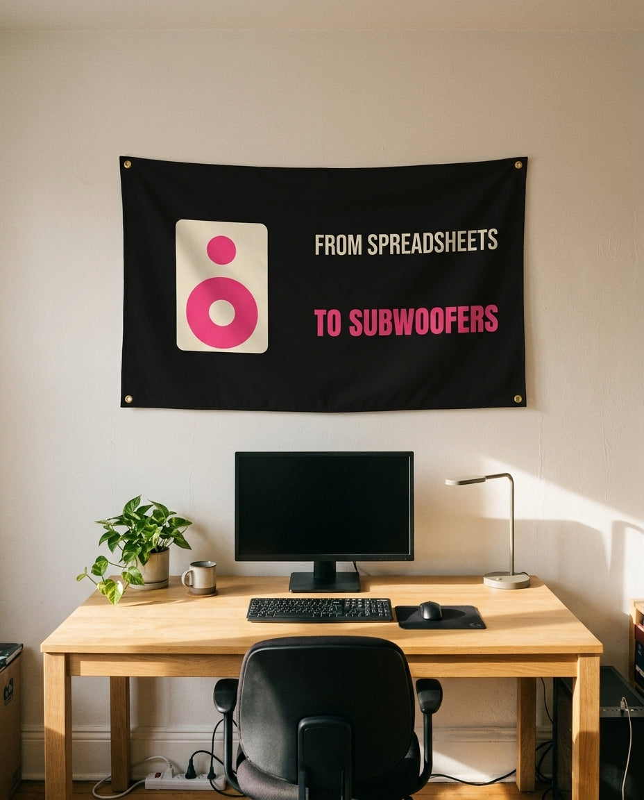 From Spreadsheets To Subwoofers 3x5 flag on a home office wall