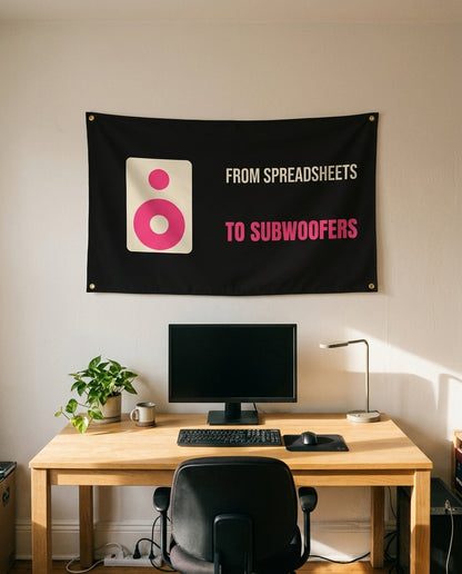 From Spreadsheets To Subwoofers 3x5 flag on a home office wall