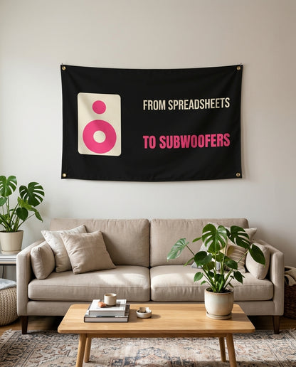 From Spreadsheets To Subwoofers flag used as living room wall decor