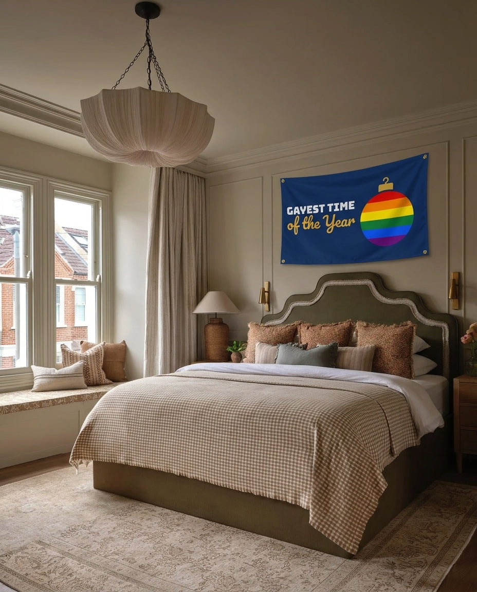 Gayest Time Of The Year pride Christmas wall flag hanging in a bedroom