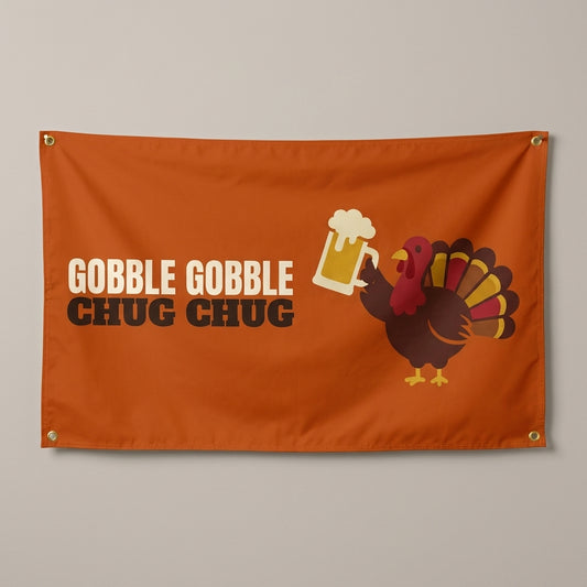 Gobble Gobble Chug Chug flag 3x5 in burnt orange with a turkey raising a beer mug, hung on a wall