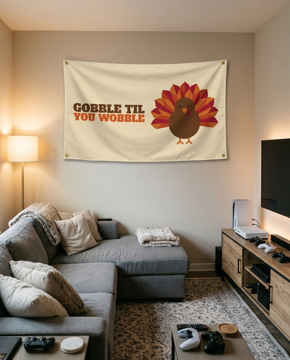 Gobble Til You Wobble flag decorating a game room wall