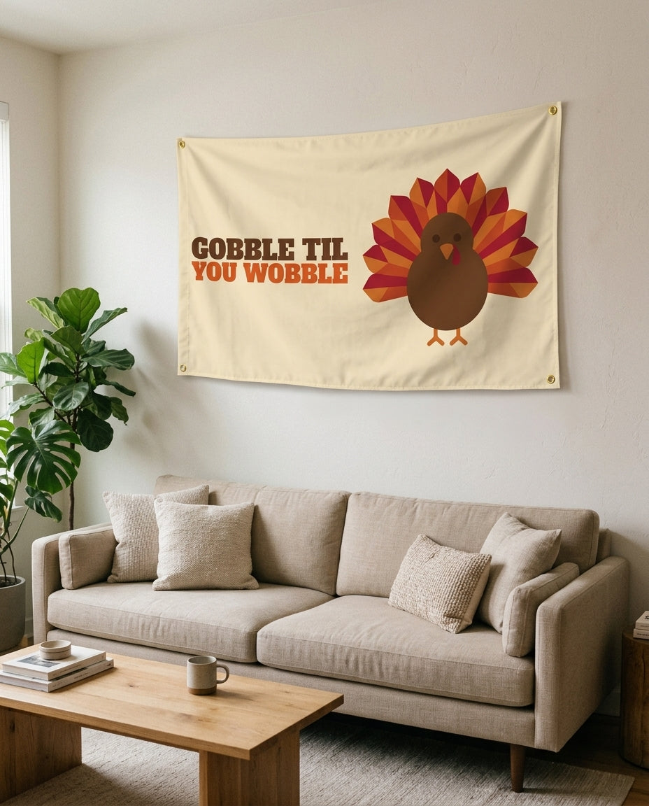 Gobble Til You Wobble flag used as living room wall decor