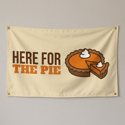 Here For The Pie flag 3x5 in cream with a pumpkin pie, hung on a wall