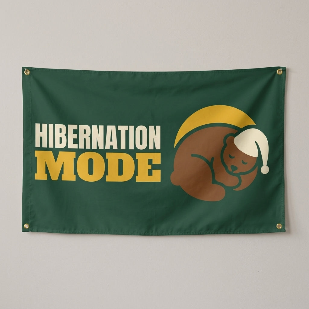 Hibernation Mode flag 3x5 in green with a sleepy bear, hung on a wall