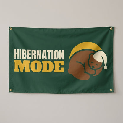 Hibernation Mode flag 3x5 in green with a sleepy bear, hung on a wall