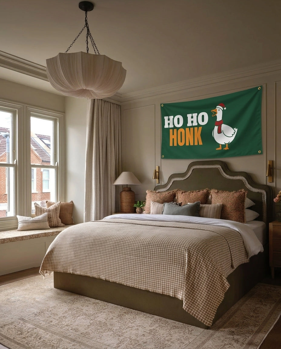 Ho Ho Honk Christmas wall flag hanging in a bedroom