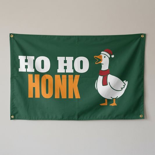 Ho Ho Honk flag 3x5 in dark green with a goose in a Santa hat, hung on a wall