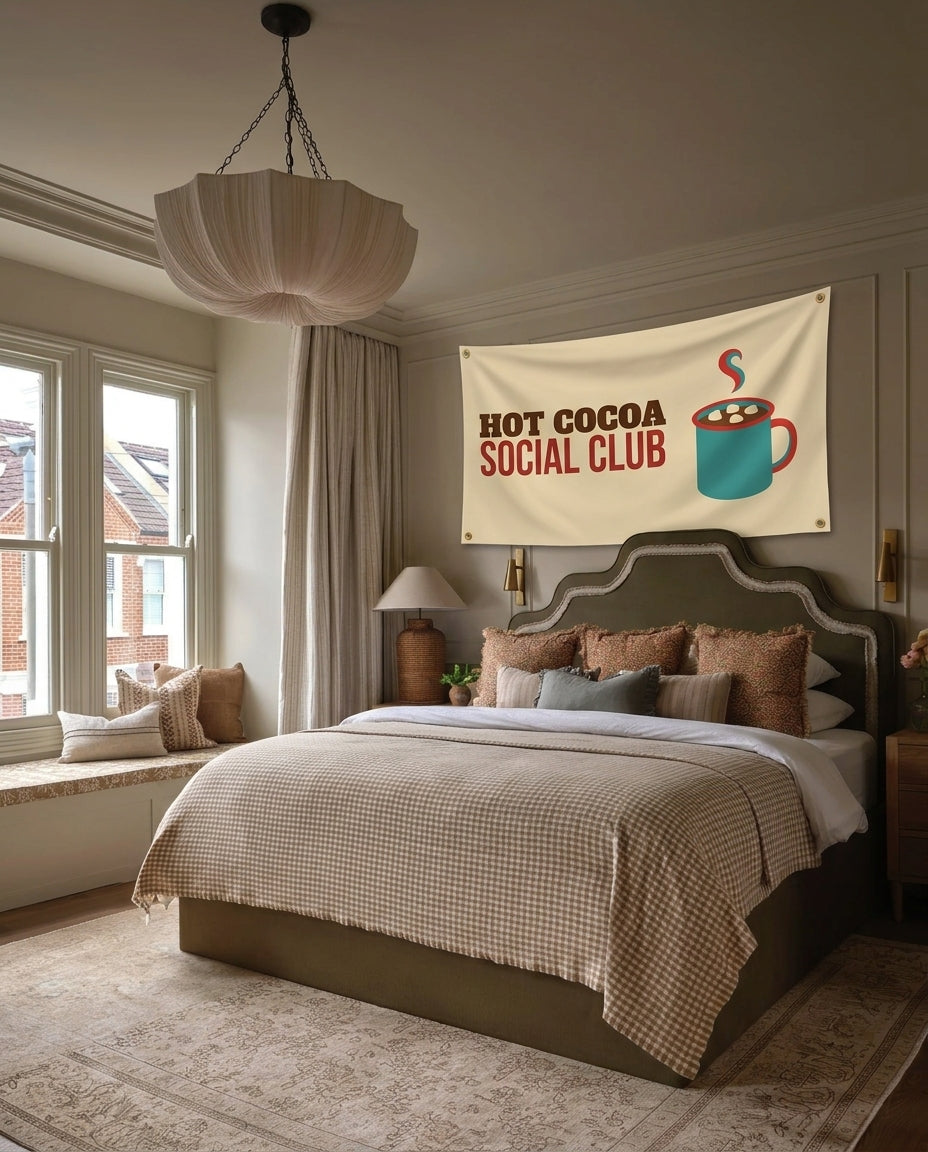 Hot Cocoa Social Club winter wall flag hanging in a bedroom