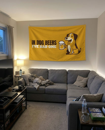 In Dog Beers Ive Had One flag decorating a game room wall