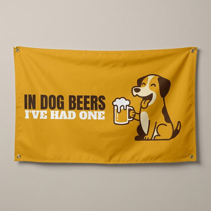 In Dog Beers Ive Had One flag 3x5 in mustard with a dog holding a beer mug, hung on a wall