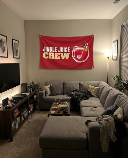 Jingle Juice Crew flag decorating a game room wall