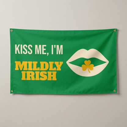 Kiss Me Im Mildly Irish flag 3x5 in green with pop art lips and a shamrock, hung on a wall