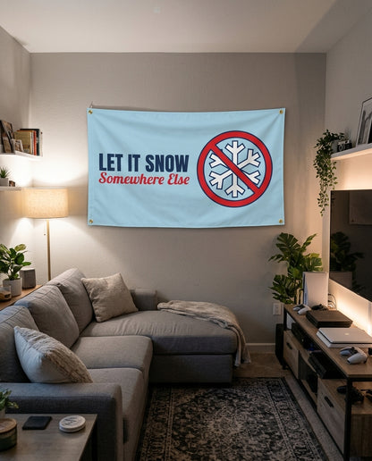 Let It Snow Somewhere Else flag decorating a game room wall