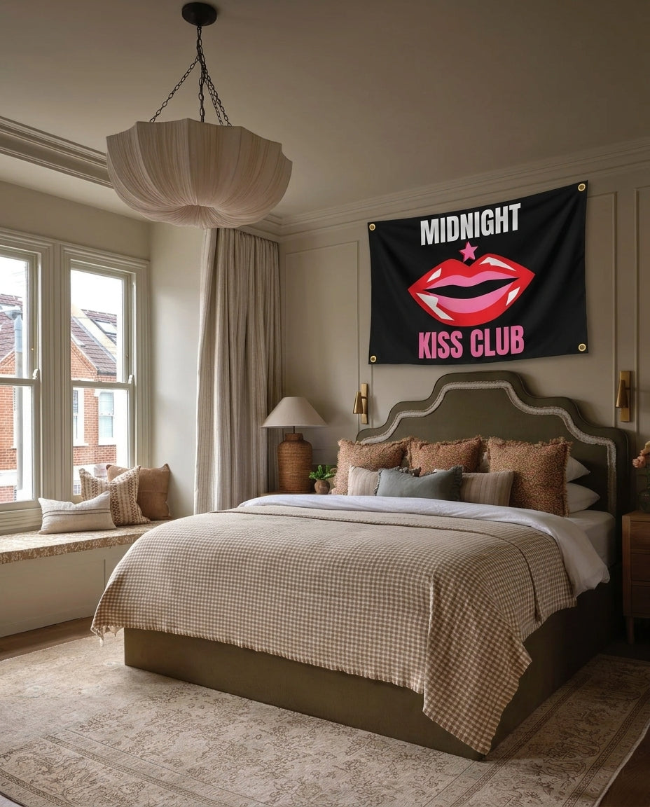 Midnight Kiss Club New Year's wall flag hanging in a bedroom