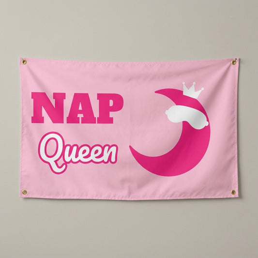 Nap Queen flag 3x5 in pink with a crowned crescent moon, hung on a wall