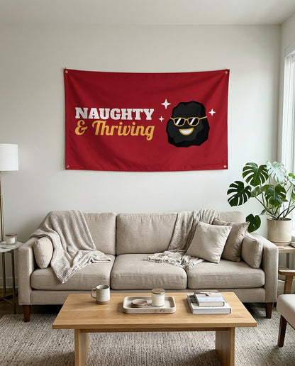 Naughty And Thriving flag used as living room wall decor
