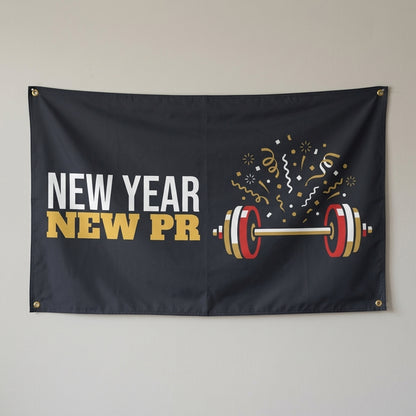 New Year New PR flag 3x5 in charcoal with a barbell under confetti, hung on a wall