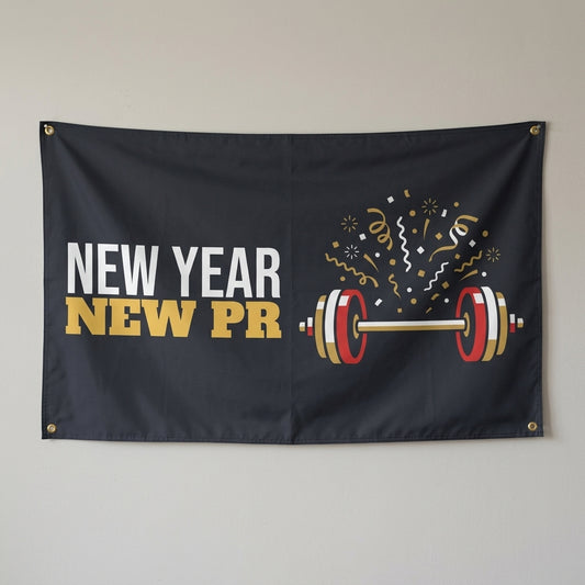 New Year New PR flag 3x5 in charcoal with a barbell under confetti, hung on a wall