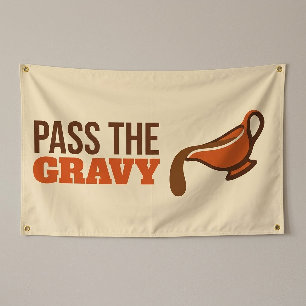 Pass The Gravy flag 3x5 in cream with a gravy boat mid pour, hung on a wall