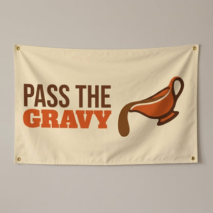 Pass The Gravy flag 3x5 in cream with a gravy boat mid pour, hung on a wall