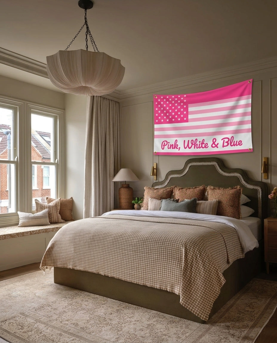 Pink White And Blue 4th of July wall flag hanging in a bedroom