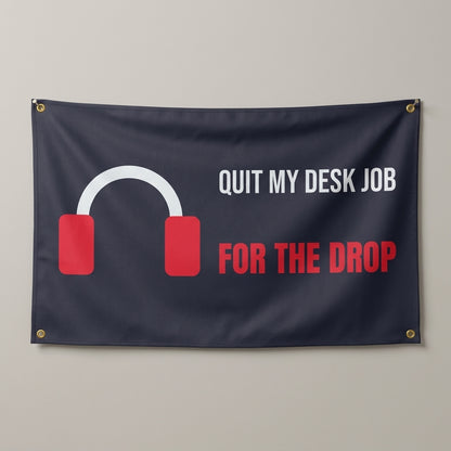 Quit My Desk Job For The Drop flag 3x5 in charcoal with headphones, hung on a wall