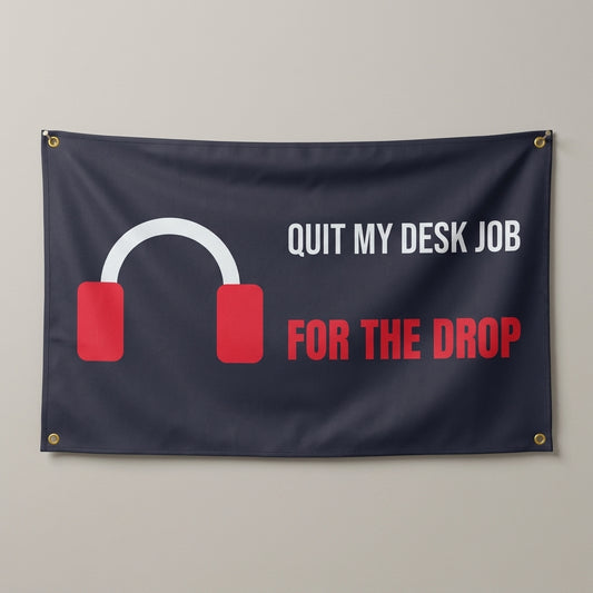 Quit My Desk Job For The Drop flag 3x5 in charcoal with headphones, hung on a wall