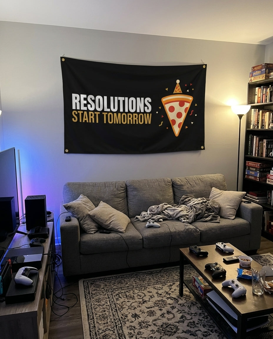 Resolutions Start Tomorrow flag decorating a game room wall