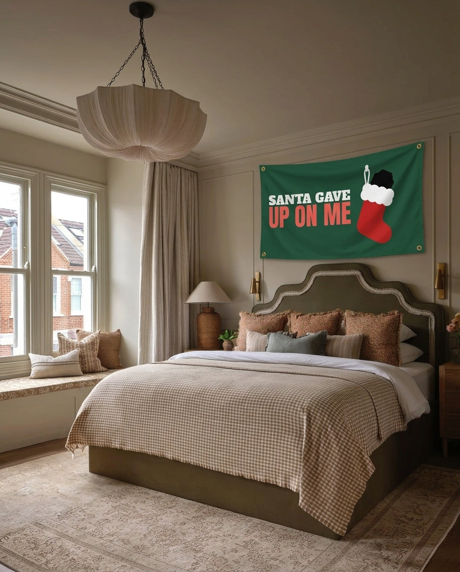 Santa Gave Up On Me Christmas wall flag hanging in a bedroom