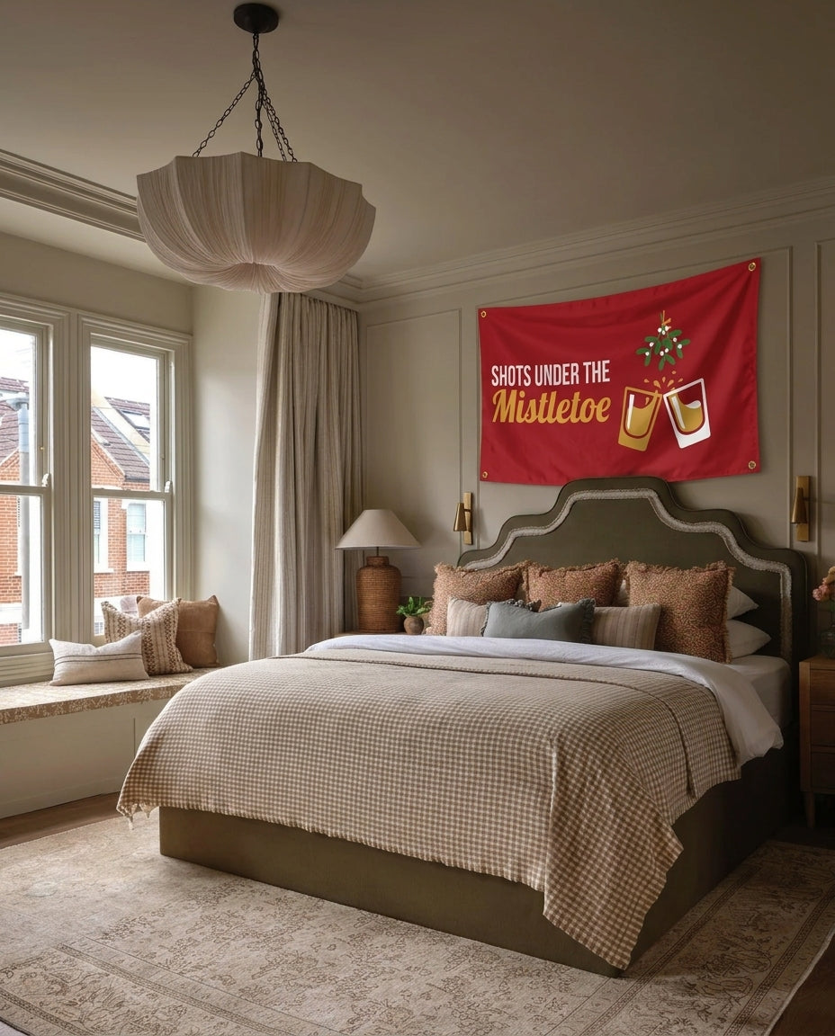 Shots Under The Mistletoe Christmas wall flag hanging in a bedroom