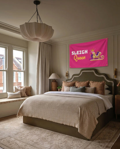 Sleigh Queen pride Christmas wall flag hanging in a bedroom
