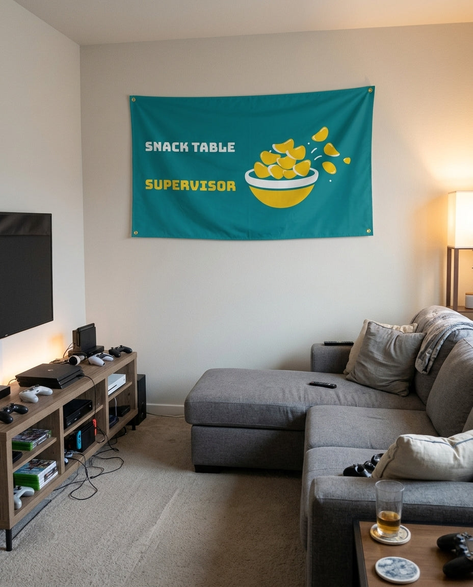 Snack Table Supervisor flag decorating a game room wall