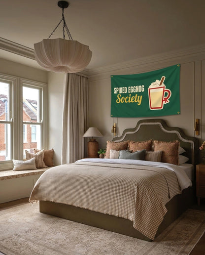 Spiked Eggnog Society Christmas wall flag hanging in a bedroom