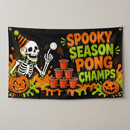 Spooky Season Pong Champs flag 3x5 with a party skeleton and red cups, hung on a gray wall