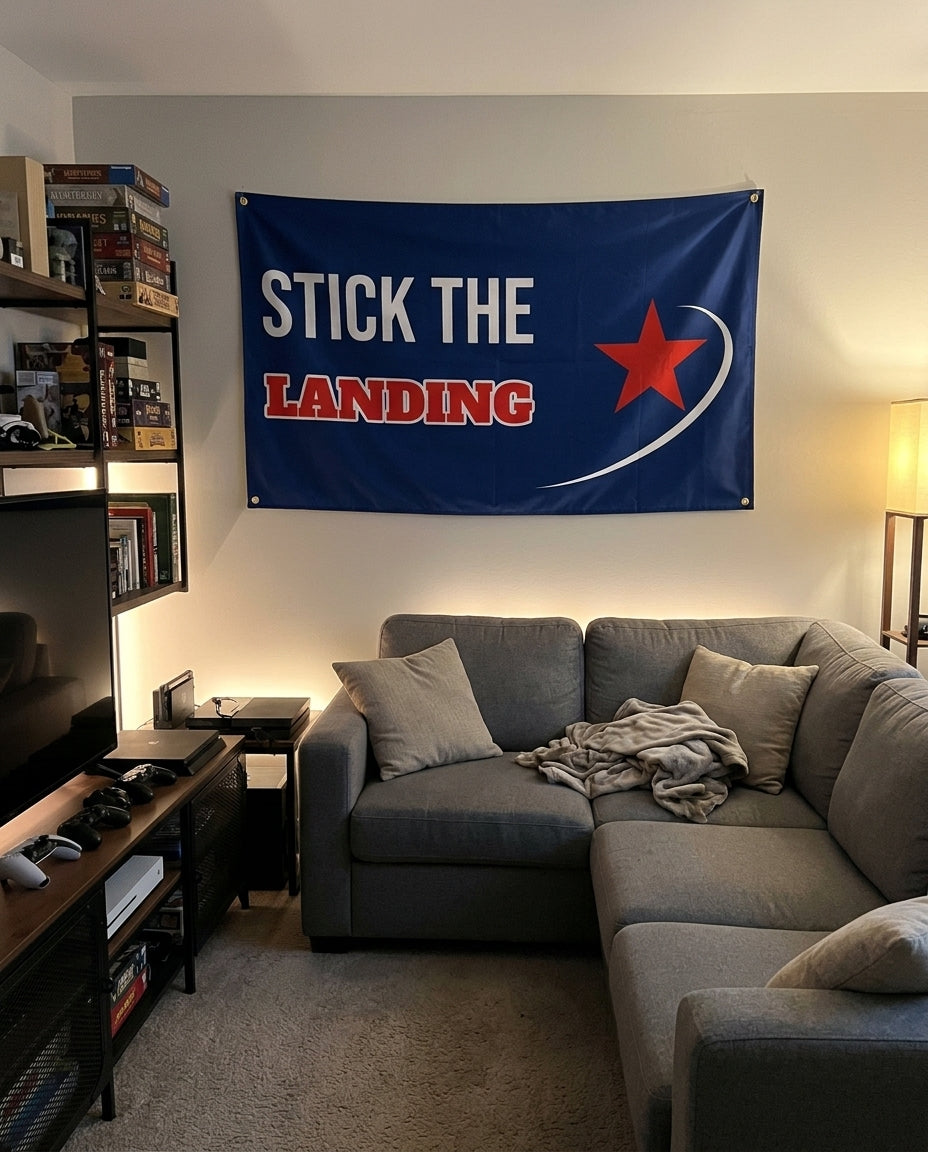Stick The Landing flag decorating a game room wall