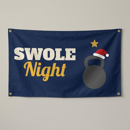 Holiday Gym Night flag 3x5 in navy with a kettlebell in a Santa hat, hung on a wall