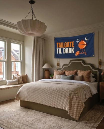 Tailgate Til Dark football wall flag hanging in a bedroom