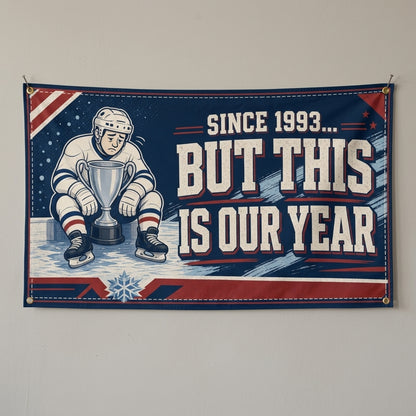 This Is Our Year hockey flag 3x5 with a sad player holding a trophy, hung on a gray wall