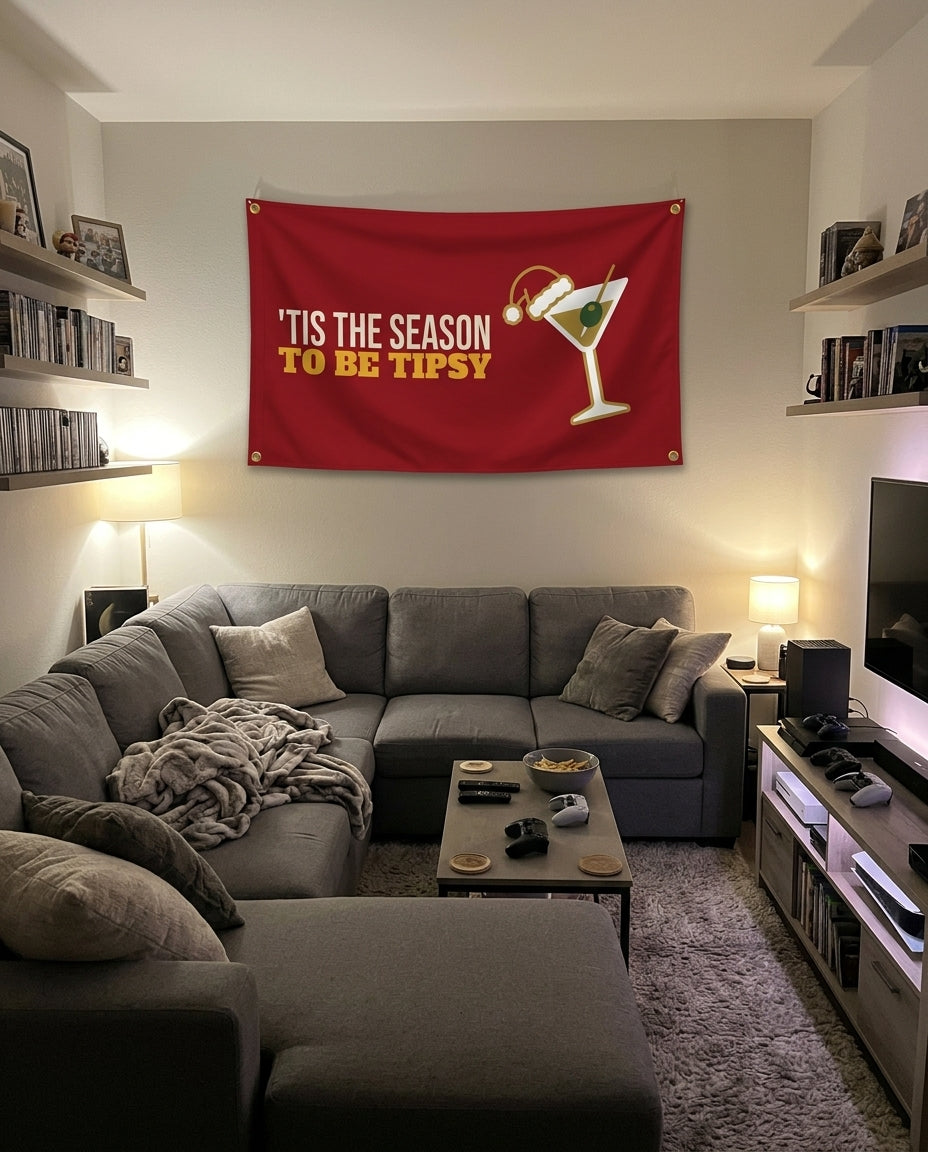 Tis The Season To Be Tipsy flag decorating a game room wall