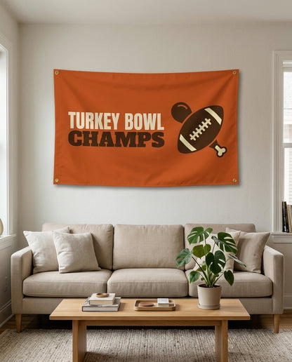 Turkey Bowl Champs flag used as living room wall decor