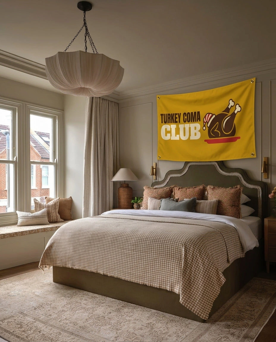 Turkey Coma Club Thanksgiving wall flag hanging in a bedroom