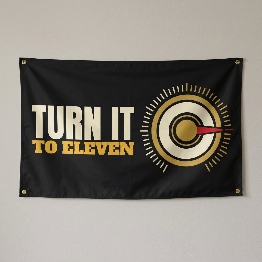 Turn It To Eleven flag 3x5 in black with a gold volume knob, hung on a wall