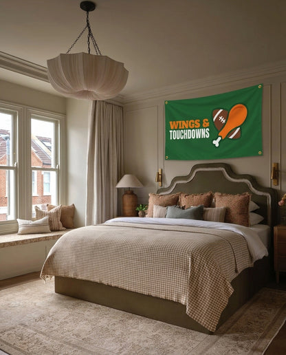 Wings And Touchdowns football wall flag hanging in a bedroom